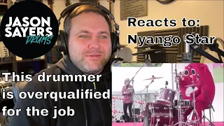 Drummer reacts to - Costumed Person Destroys The Drums At Children’s Music Concert - NyangoStar