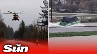 Canada flooding - Boat zips along flooded highways