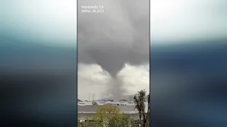 Apparent tornado rips roofs off buildings in Los Angeles County