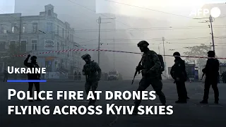 Ukrainian police fire at drones swooping low across Kyiv skies | AFP