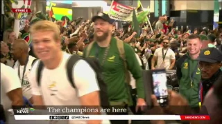 The champions return with the RWC to much jubilation
