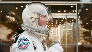 Austranaut space suit wearing girl at Los Angeles California