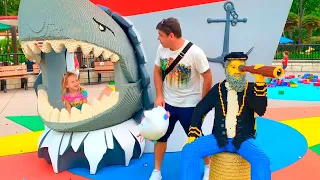 Nastya and dad have fun in the amusement park Legoland