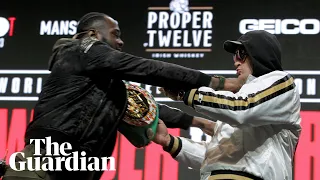 Deontay Wilder and Tyson Fury shove and taunt each other before rematch