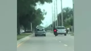 Car runs motorcyclist off road in Sarasota