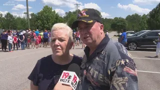 Volunteers honored veterans by placing flags at graves of veterans