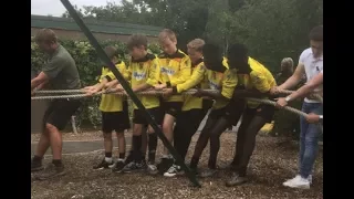 Watch Kids Have Tug-Of-War with Real-Life Lion