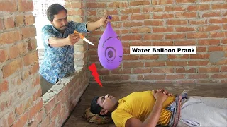 Giant Water Balloon Prank On Sleeping Guy