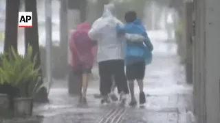 Typhoon Khanun slams Japan's southern islands