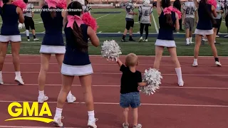 Toddler cheers for football team with big sister l GMA