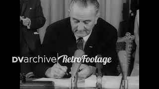 1965 - LBJ signs the Medicare Bill into law at the Truman Library