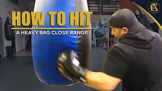 How to Hit a heavy bag Close Range | Coach Anthony Boxing