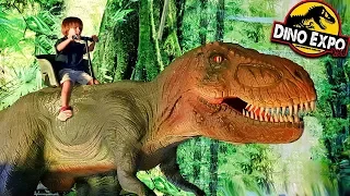 Dani y Evan MONTAN en T-REX en DINO EXPO XXL!!  Muchos DINOSAURIOS en MOVIMIENTO!!