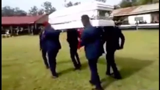 Coffin dancers drop coffin