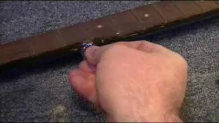 Luthier Richie Dotson changing a Friction Banjo tuner to a Geared one.