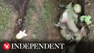 Russian soldier catches and throws bomb dropped by Ukrainian drone