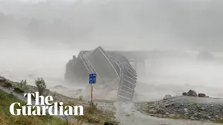 A New Zealand bridge is swept away in torrential rain and flooding on the South Island