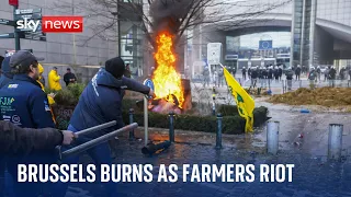 Fires erupt as farmers protest outside European Parliament in Brussels