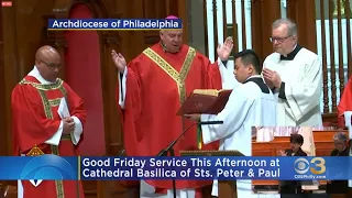 Good Friday Service Held At Cathedral Basilica Of Saints Peter & Paul