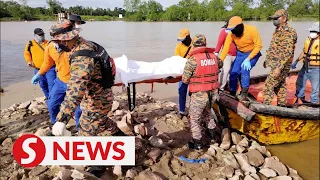 Missing man's headless body found in river, croc attack suspected