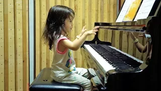 Listening to Piano by Emilie Barton, 2 years old