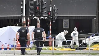 Man kills 3 in Belgium with guns of stabbed police officers