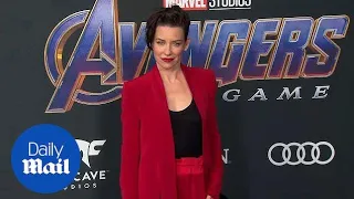 Evangeline Lilly dresses in red suit for Avengers premiere