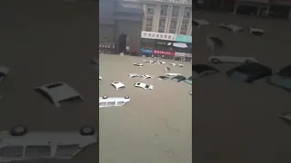 *SHOCKING* China floods traps people inside subway trains and cars