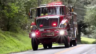 Fire Trucks Responding Code 3 to a Wildland Fire w/ Water Tenders