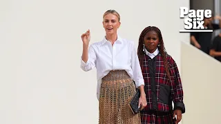 Charlize Theron sits front row with daughter Jackson, 11, at Dior fashion show