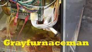 Clean the condensate drain of the 90% gas furnace