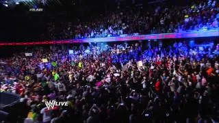 Seth Rollins of The Shield slips over barricade on WWE Raw