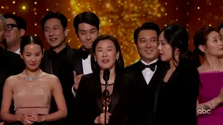 'Parasite' team take the stage to accept their historic best picture win at the Oscars