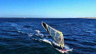 Early morning solo windsurfer