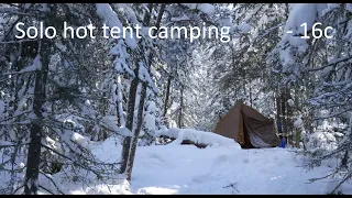 Solo hot tent camping in the cold and snow.