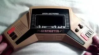 Bandai Gunfighter Handheld electronic game review