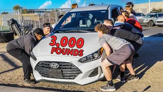 How Many People Does it Take to Lift a Car?