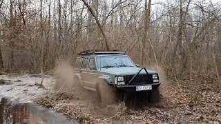 XJ Jeeps & Land Rover in the mud...
