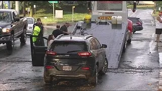 Car struck after bridge floods in Chicopee