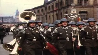 Civilians in May Day parade in East Berlin. HD Stock Footage