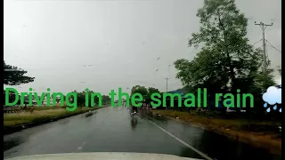 Driving in the small rain and cloud at the countryside with song