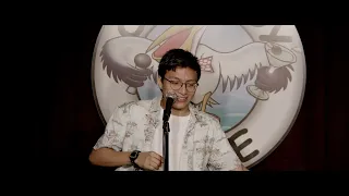 Comedian Bombs at Open Mic Night