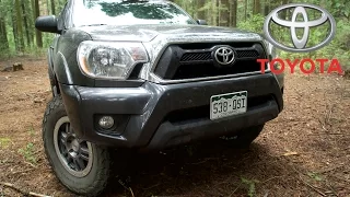 Toyota Tacoma aftermarket. 33-inch tires, off road