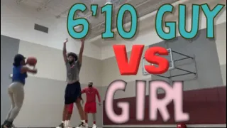 Girl vs guys  basketball game ( 6’0 and 6’10 men)