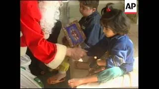 IRAQ: BAGHDAD: SANTA CLAUS BRINGS RELIEF TO HOSPITAL CHILDREN