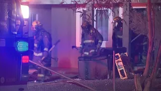 VIDEO: Overnight house fire displaces Phoenix family of 2