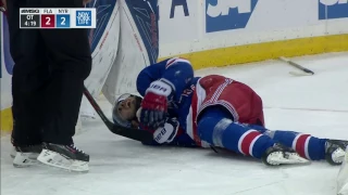 Zibanejad injured sliding hard into end boards feet first