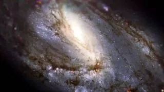 Hubble Zooms Into M66 [1080p]