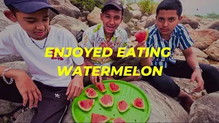 three young guys eat sweet watermelon by the riverside #villagelife #adventure #watermelon #eating