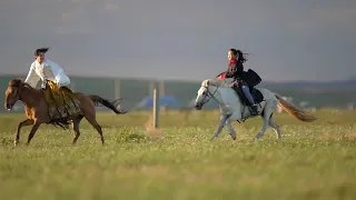 Horse-faced skirt and Mongolian robe riding a galloping horse (Inner Mongolia, China)